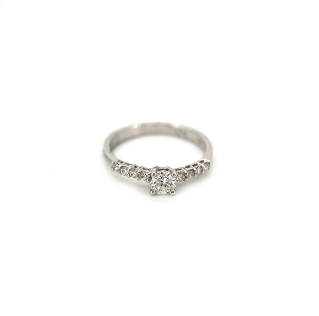 18K White Gold Ring Studded With Round Diamond with 0.32ct