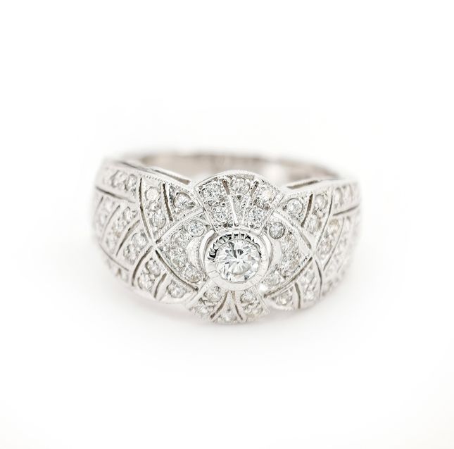 0.12ct Round Diamond Ring in 18K White Gold